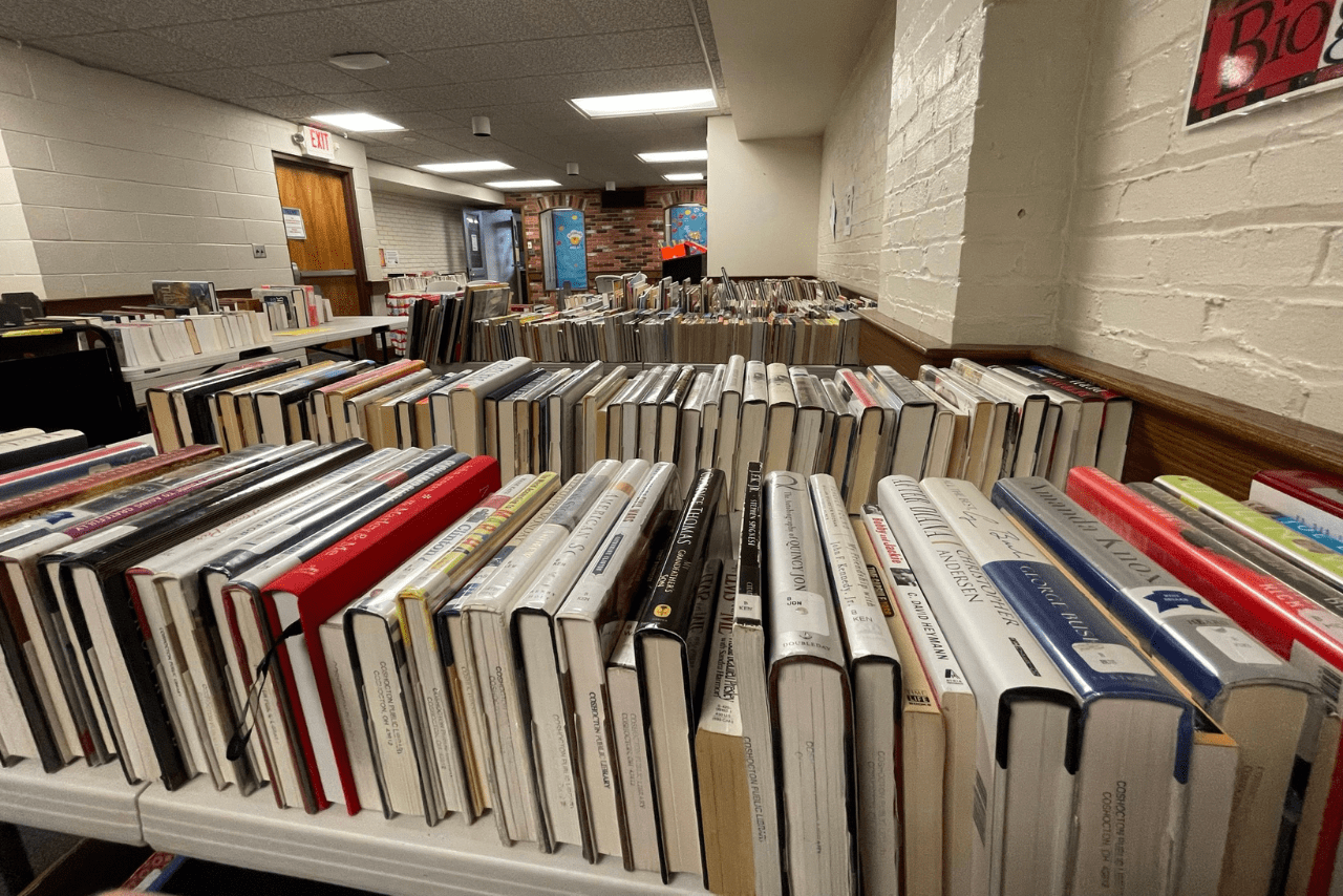 Tables of books at the Coshocton Friends of the Library annual sale 