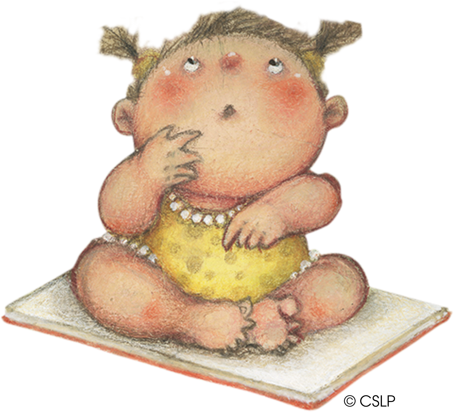 baby sitting on book